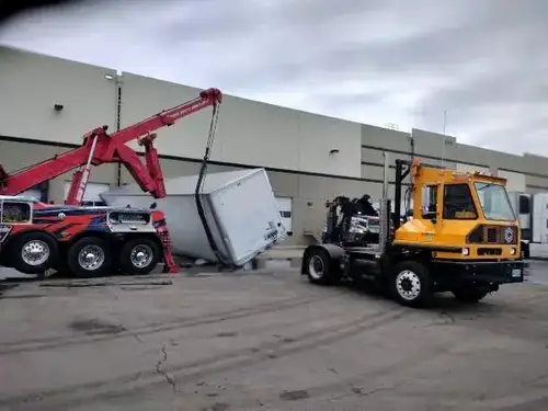 Rocky Mountain Towing rotator uprighting overturned semi
