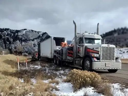 Rocky Mountain Towing lifting heavy equipment